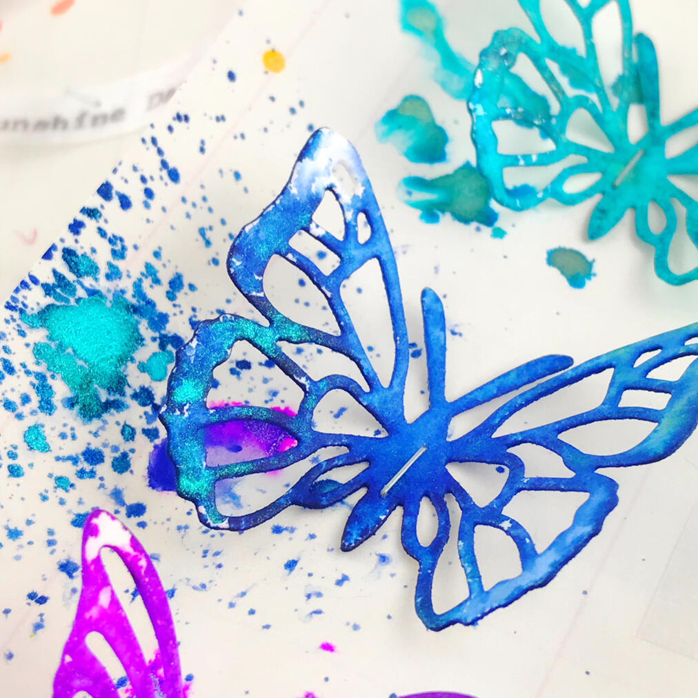multi-color spray inks on paper butterflies